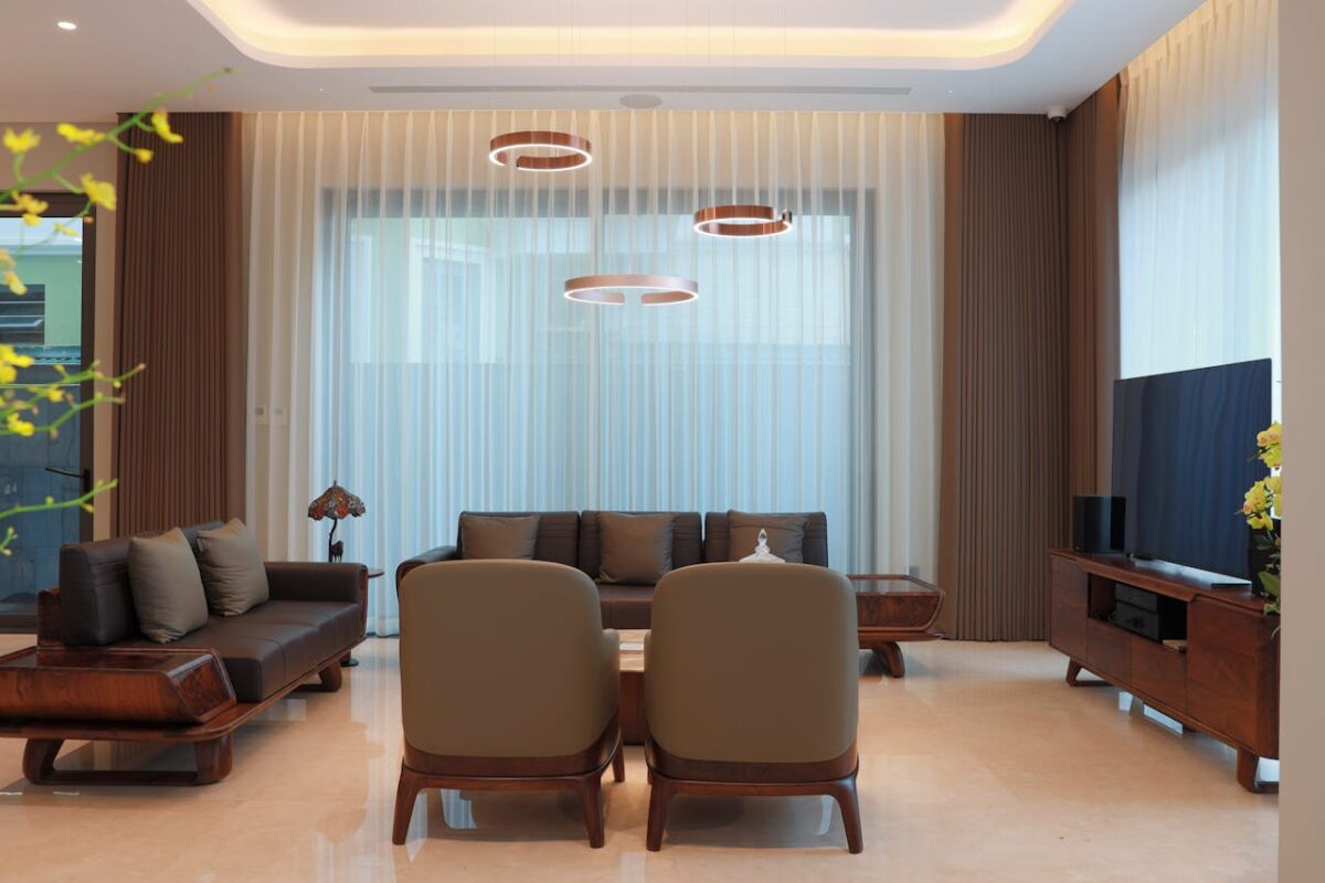 Spacious modern living room featuring elegant furniture and a cozy ambiance.